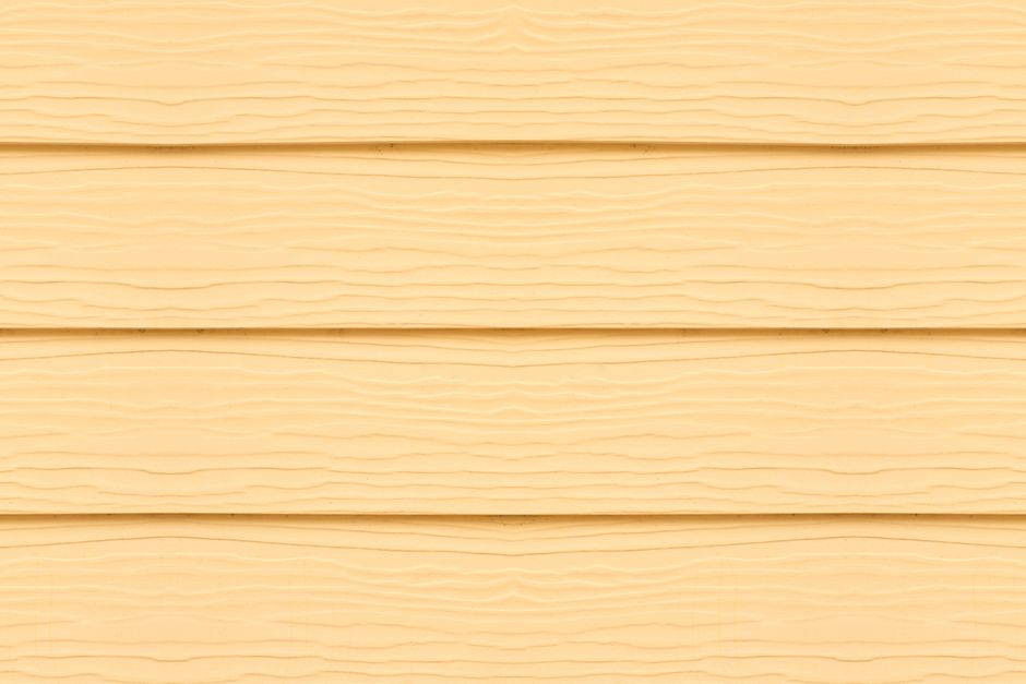 Close-up of fiber cement siding board and batten trim on a Louisiana home