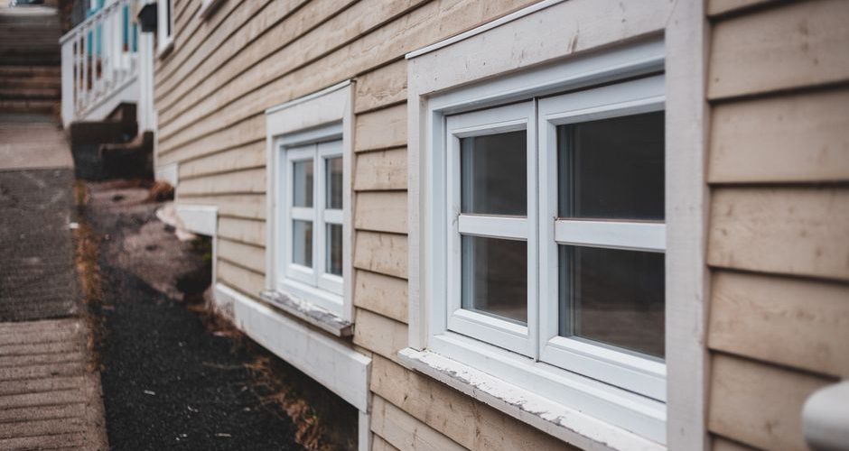 Cypress, pine, and cedar wood siding samples compared side by side